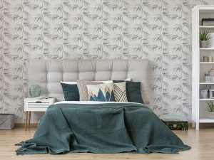 The 106748 Asia Light Grey Wallpaper is contemporary bamboo floral design in muted greys on a off-white lightly textured background.