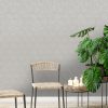 Bakau Grey wallpaper is an elegant diamond geometric motif design with metallic elements and a raised acrylic textured finish. It is ideal for any room.