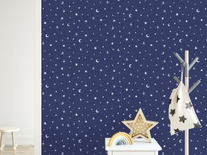 This simple Stars and Moon Navy wallpaper is a glow in the dark design. Stars and moons will glow when the lights are turned off! Ideal for playrooms and children’s bedrooms.