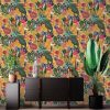 Reverie Ochre wallpaper is a quirky and fun tropical design. It features parrots, chameleons and bush babies set within bold tropical leaves.