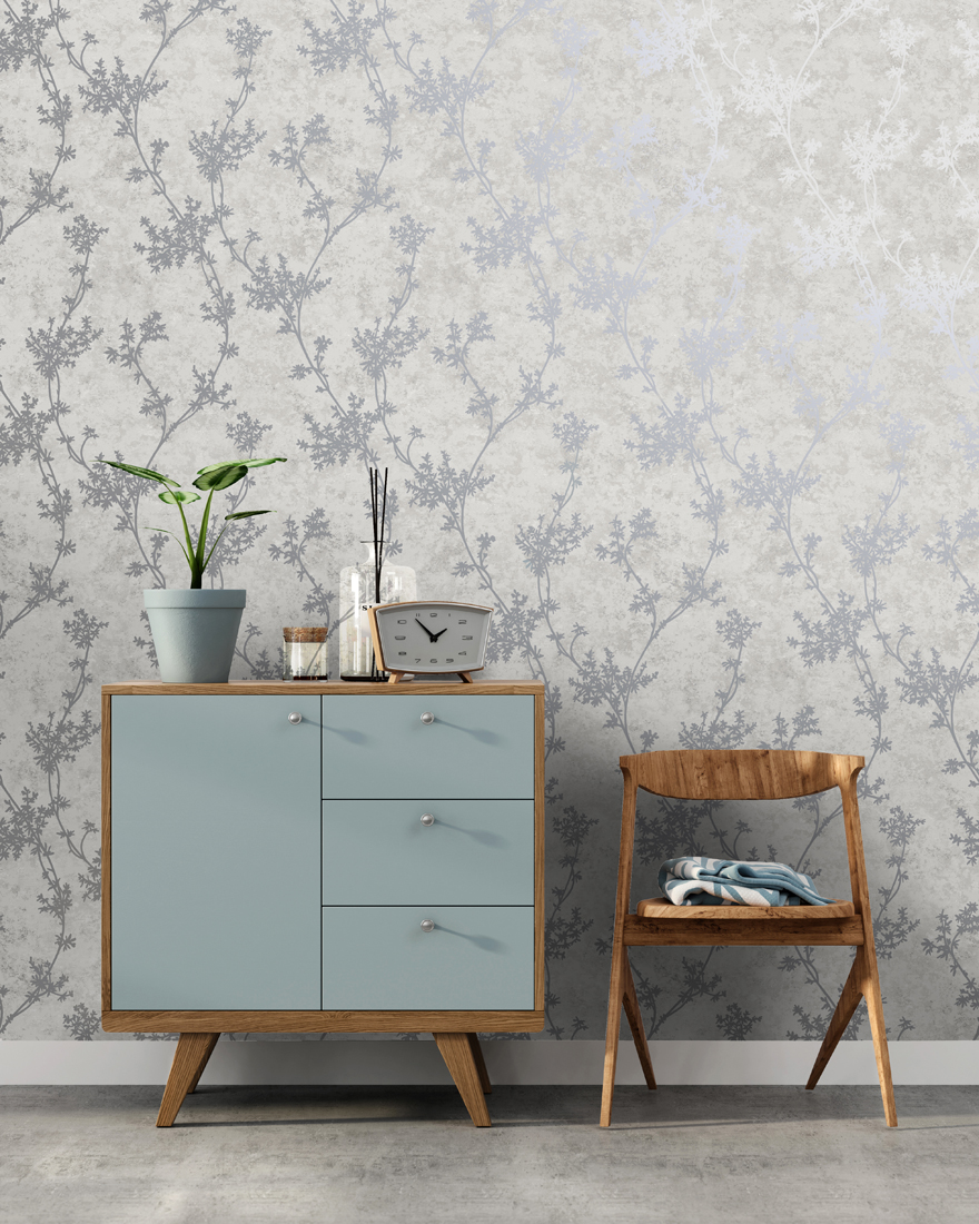 Chevril Taupe is a trail wallpaper, which features metallic floral trail that contrasts against a raised, textured industrial background.