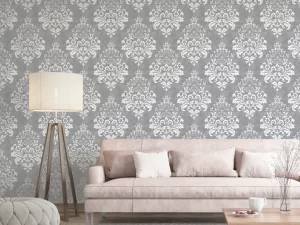 The Baroque Damask Grey and White Wallpaper is a stunning design which features a prominent white baroque style damask on a grey background.