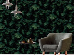 Fern Wall Green wallpaper adds a striking design to your walls with deep green leaves on a dark background that make the design look 3D.