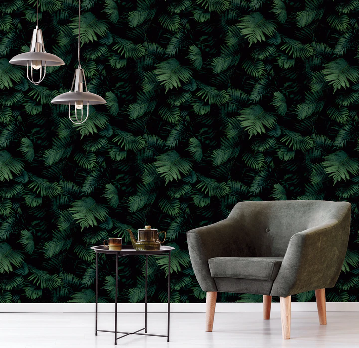 Fern Wall Green wallpaper adds a striking design to your walls with deep green leaves on a dark background that make the design look 3D.
