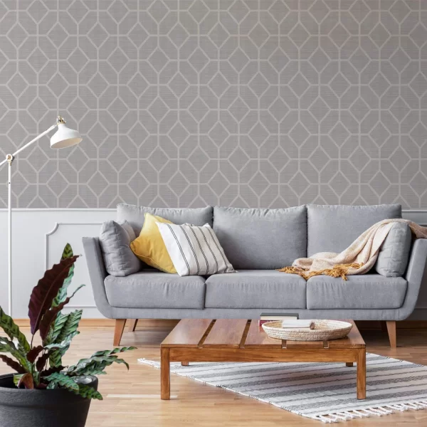 The Asscher Geo Beige wallpaper is a gorgeous and neutral textured vinyl grass cloth effect design with a mid scale geometric trellis with metallic highlights.