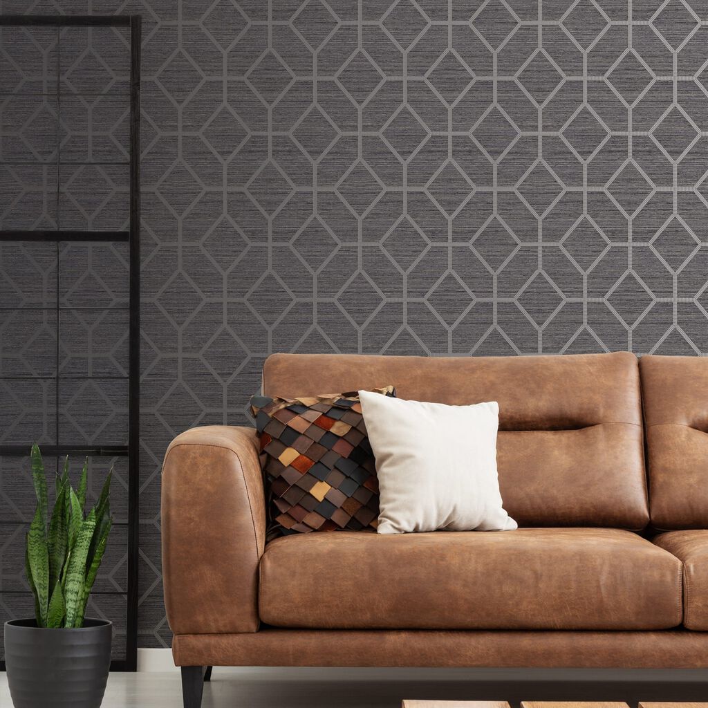 The Asscher Geo Grey wallpaper is a gorgeous textured grass cloth effect design with a mid scale geometric trellis with metallic highlights.