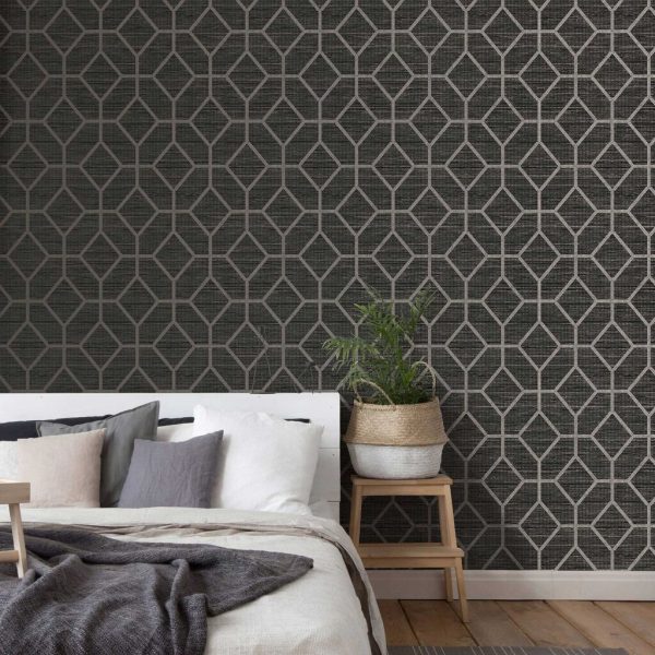 The Asscher Geo Onyx wallpaper is a gorgeous textured grass cloth effect design with a mid scale geometric trellis with metallic highlights.