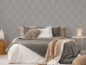 Optical Geo Silver wallpaper is a gorgeous texture that resembles swathes of folded silk under an optical geometric design of repeating ogee shapes.