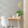 Gilded Concrete Pearl wallpaper is an elegant textured design, with a distressed concrete effect which is highlighted with metallic hues.