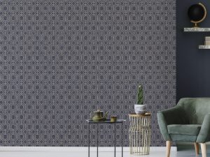 Luxe Geo Navy wallpaper is set upon a textured base for a luxurious look, with the gold geometric detail to give it extra sophistication.