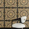 Versace Barocco Black & Gold Wallpaper is a bold, baroque floral print design and is perfect for adding depth and an eye-catching appearance to a room.
