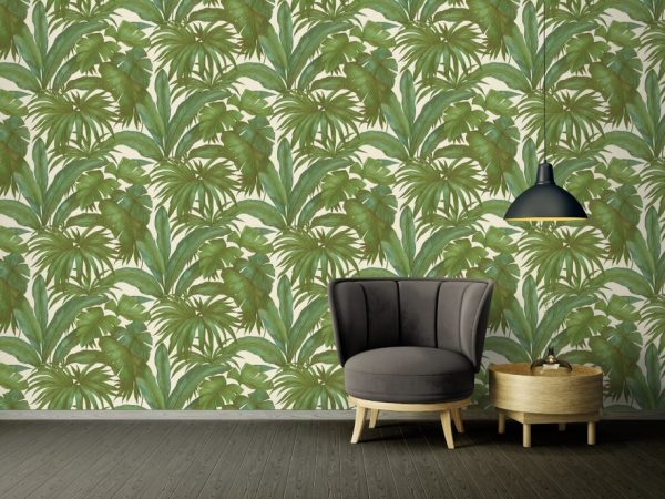 Versace Jungle Green wallpaper is a large scale tropical green leaf design on a cream background inspired by one of the most iconic prints from Versace