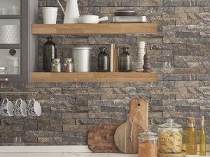 Stone Cladding Natural Wallpaper is a faux stone wall design that has stacked stones in a perfect pattern and gives the appearance of a real stone wall.