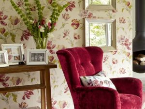 Gosford wallpaper, shown here in cranberry. With an abundance of blooming tulip flowers in a riotous colourful display Laura Ashley's classic Gosford Meadow design makes a bold statement.