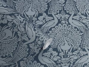 Peacock Damask Dusky Seaspray Wallpaper design features striking peacocks parading side by side, this elegant design makes a statement worth showing off.