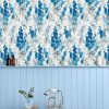 Stocks Blue Sky Wallpaper is a stunning and timeless floral print featuring beautiful blooms. This heritage design has dense bunches of stocks flowers on a large scale; this meandering stem design is perfect for creating a nature inspired interior.