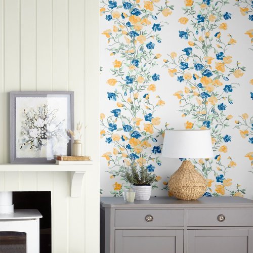 Charlotte Pale Gold Wallpaper features intertwined bunches of sweetpeas cast amongst scrolling tendrils and falling leaves and has a beautiful vintage feel