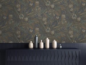 Susara Navy Wallpaper is an eye-catching tropical design featuring rattan textured patterns set within large leaves and protea flowers.
