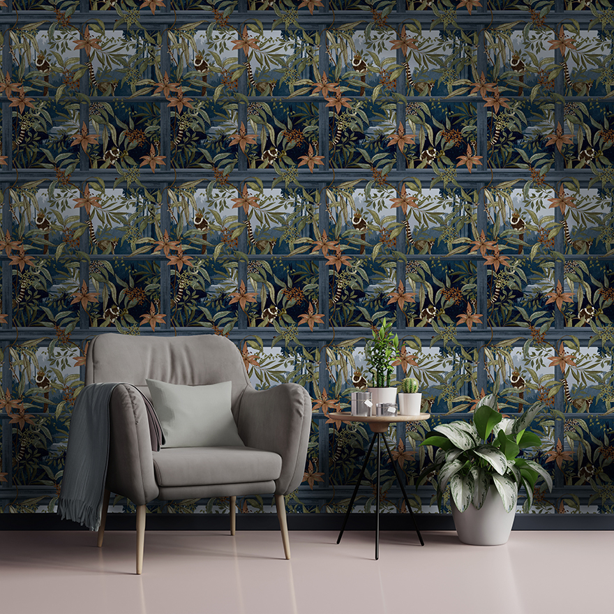 Comoro Navy Wallpaper is an eye-catching window design featuring a trailing floral and crowned Lemurs set within a painterly tropical scene.
