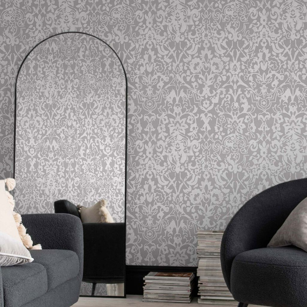 Majestic Damask Grey Wallpaper is a luxurious wallpaper design which features an intricate, detailed damask in a full silver metallic sat upon a deep grey background.
