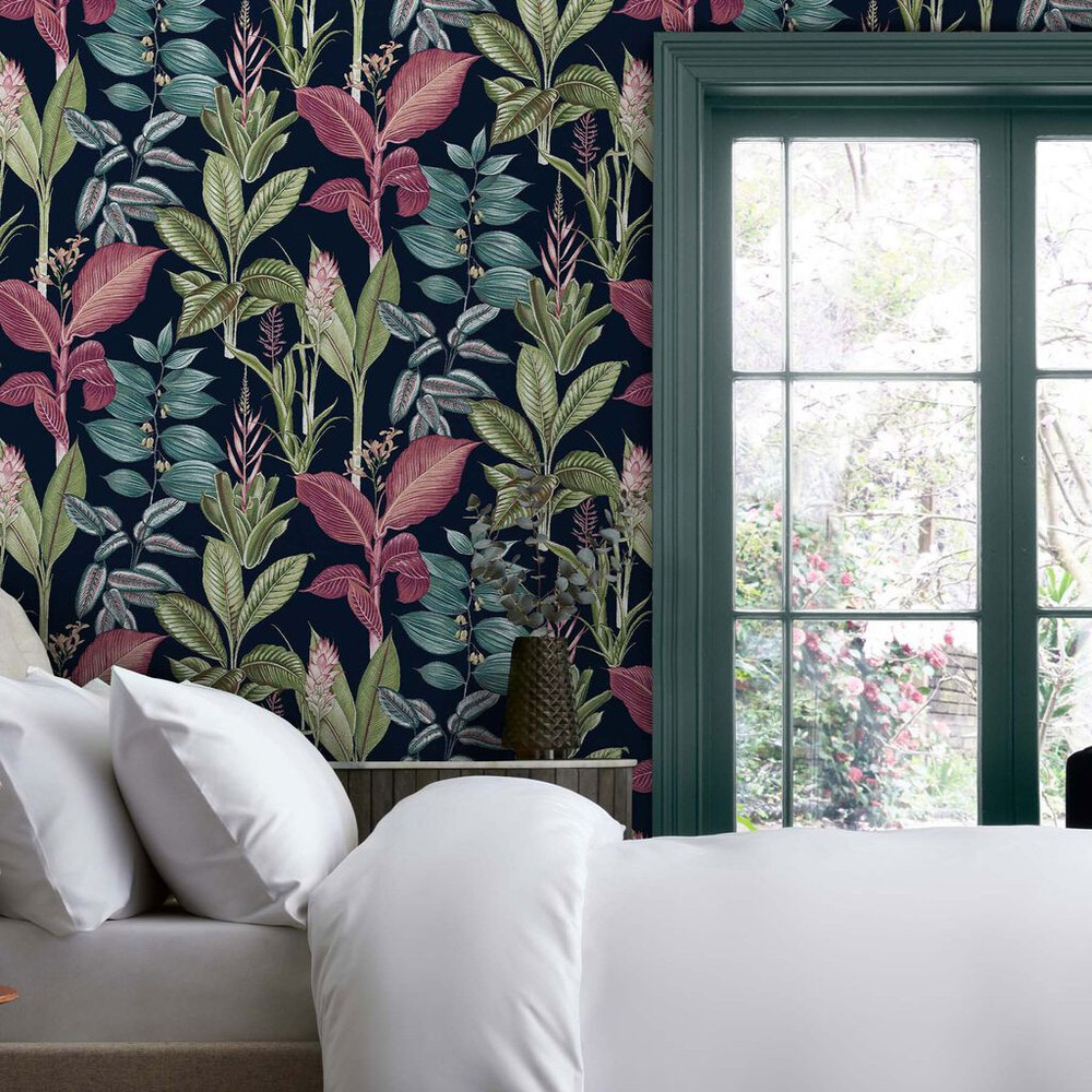 Turn your interior into a tropical haven with the Fantasy Rainforest Leaves Navy Wallpaper. This colourful, bold design is perfect to create a focal point.