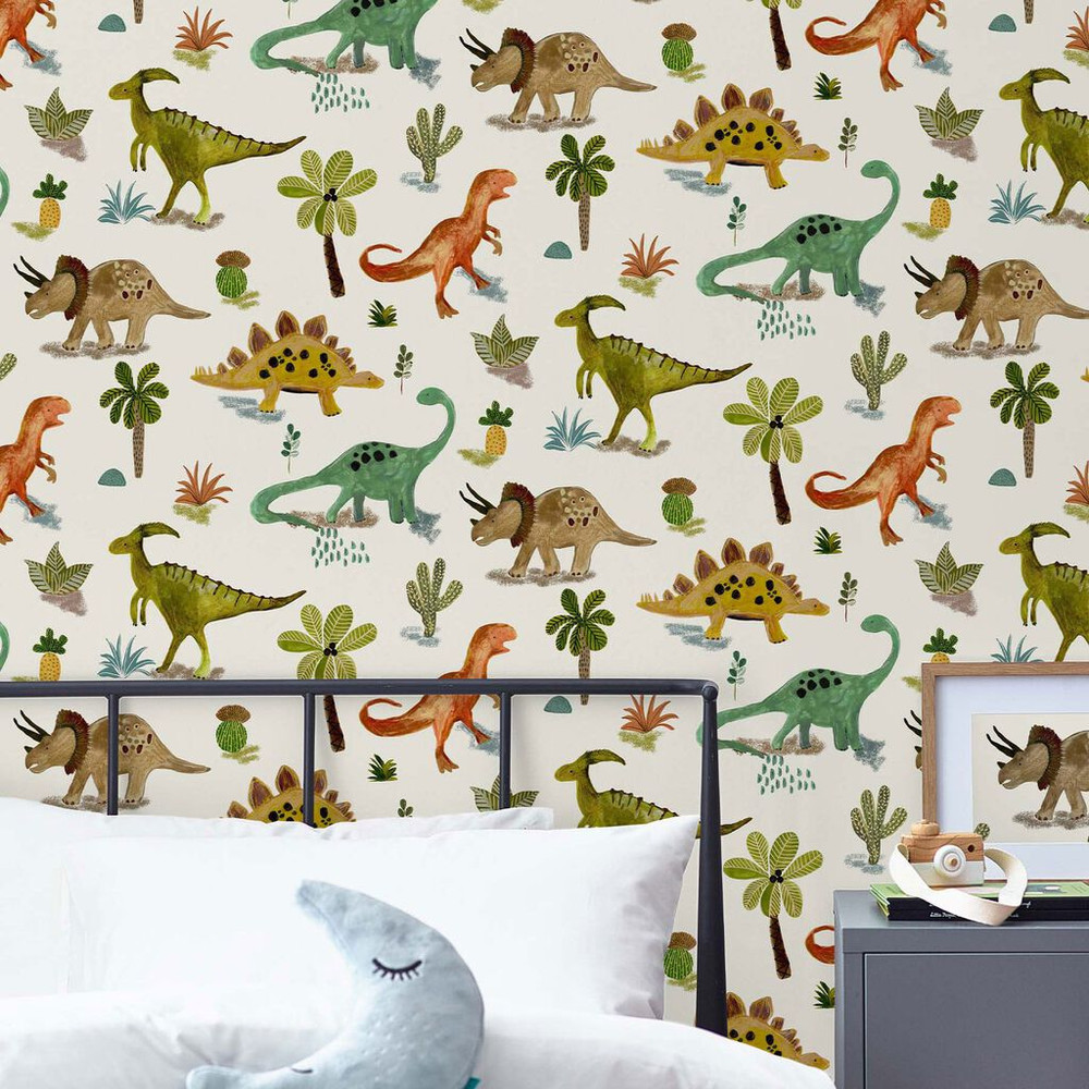 Add some prehistoric mischief to your walls with this Dinosaur & Friends Wallpaper. Dinosaurs roam across this childrens wallpaper which features shades of green, yellow, orange and blue on a neutral cream background.