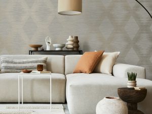 Serenity Geo Neutral And Gold Wallpaper is a large scale geometric with grasscloth textured background adding depth and luxury to the design.
