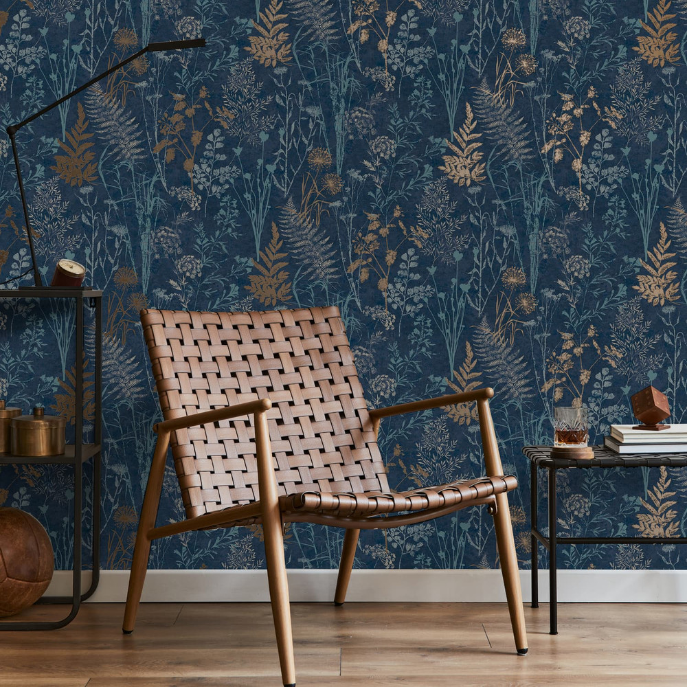 Organics Navy And Copper Wallpaper features silhouettes of wildflowers and seedheads embellished with metallic, encompassing the outside natural world.
