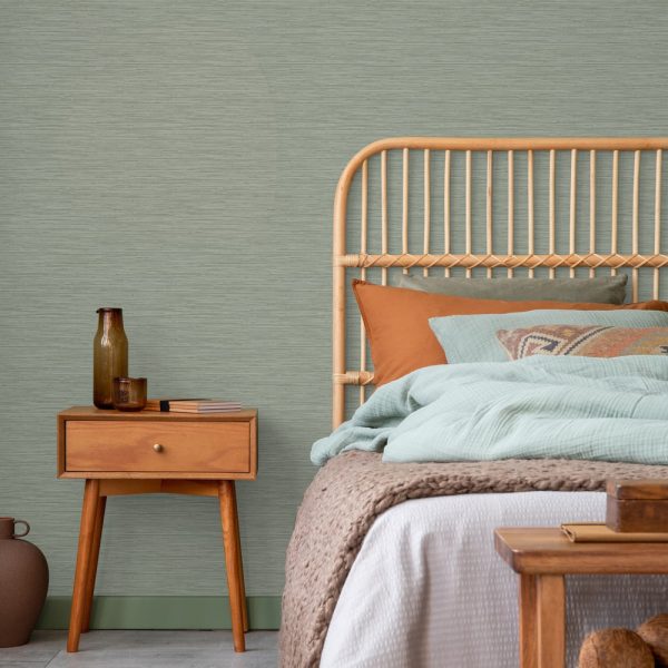 Serenity Plain Sage Wallpaper is a simple yet elegant grasscloth textured design, sure to add depth and luxury to your interior.