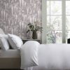 Wisteria Trails Mauve Wallpaper is an elegant floral wallpaper with a beautiful mauve backdrop laced with delicate branches adding a touch of class.