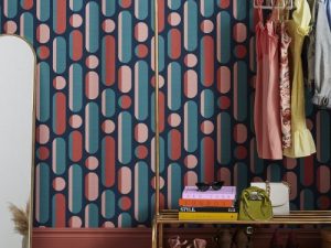 Morse Coral & Navy Wallpaper is a curvaceous geometric which gives a retro vibe yet in this seasons hot colour palette of coral, teal and blue.