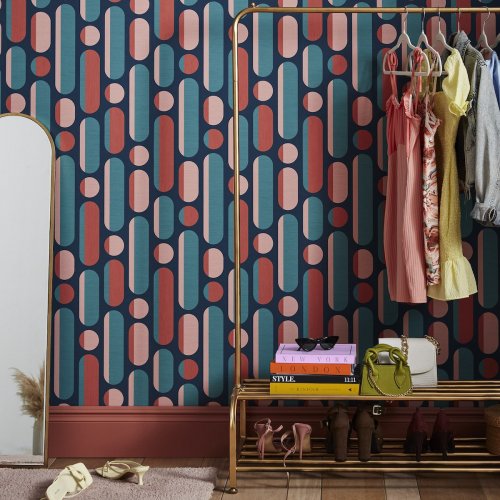 Morse Coral & Navy Wallpaper is a curvaceous geometric which gives a retro vibe yet in this seasons hot colour palette of coral, teal and blue.