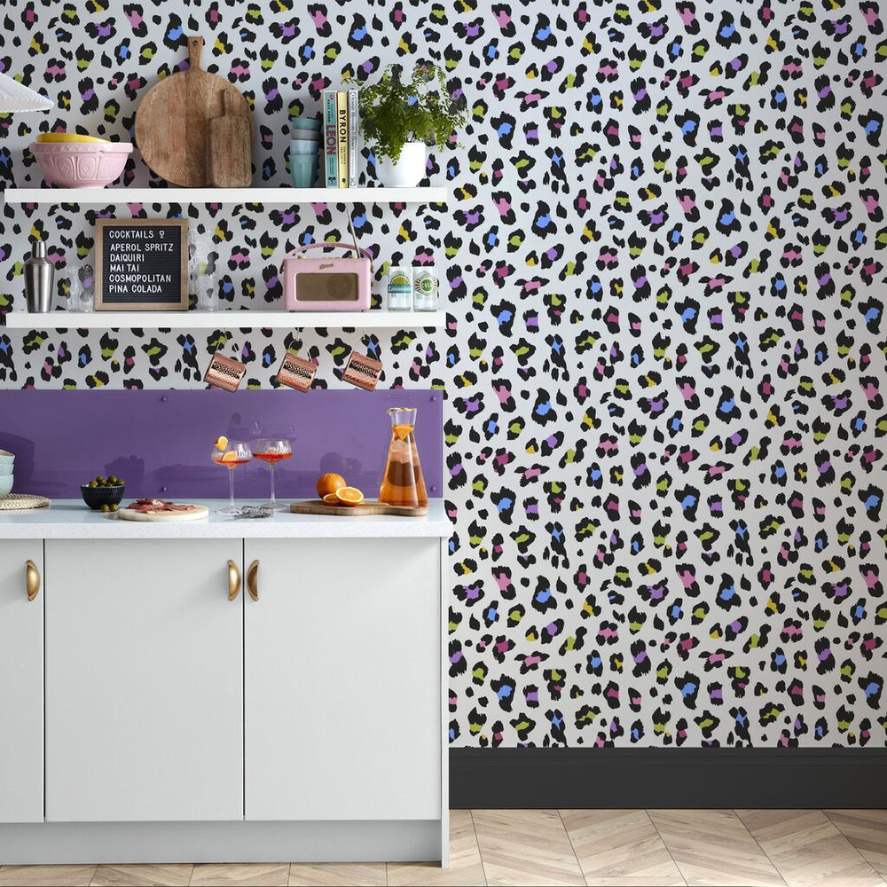 Big Cat Tutti Frutti Wallpaper fabulous animal print features a juicy combo of kiwi, raspberry and blueberry tones giving a youthful edge to your walls.