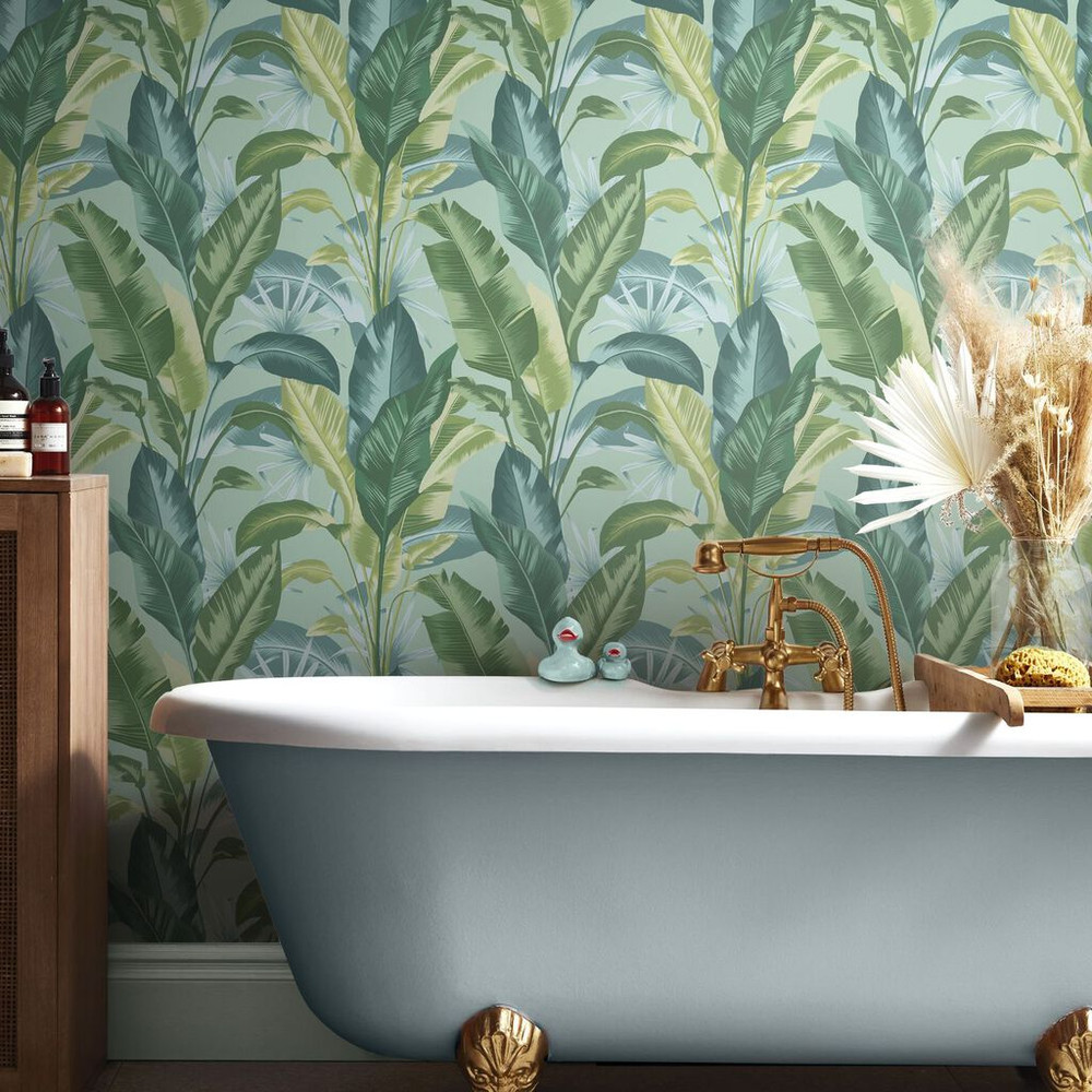Leaf It Out Twilight Wallpaper print combines calming aqua, blue and green tones to create chilled out vibes, bringing the outside in.